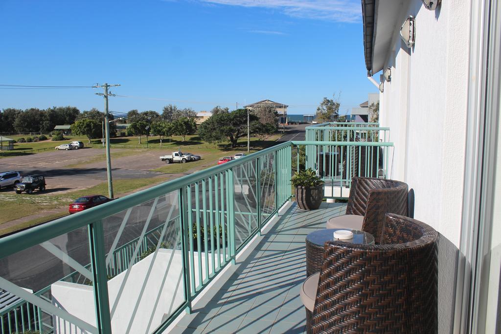Oceanside Hawks Nest Hotell Rom bilde